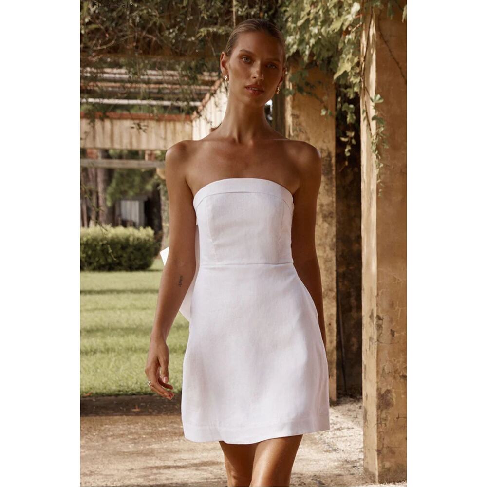 DISSH -AISLE WHITE LINEN BACK BOW DRESS